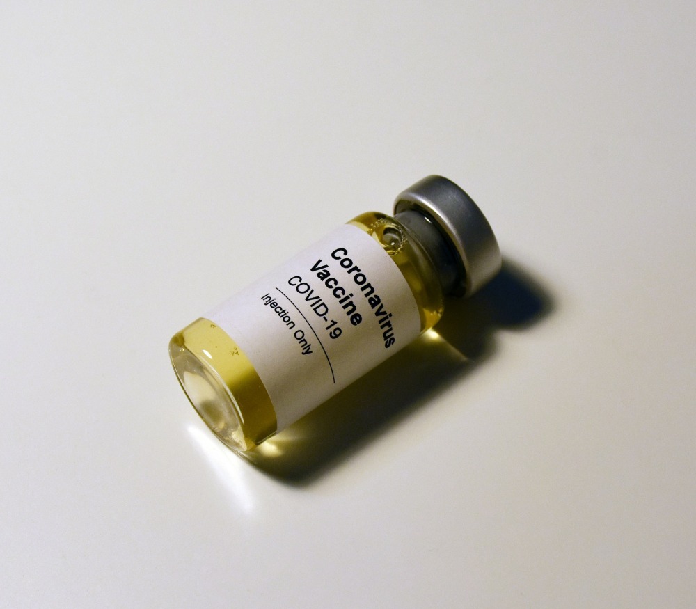 covid-19 vaccine stock photo by hakannural, from UNSPLASH