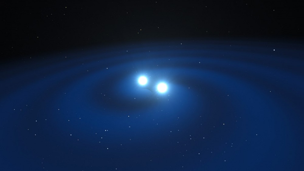 merging neutron stars. by ESOL. CalçadaM. Kornmesser
