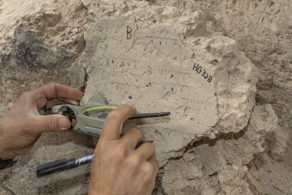 Measurements of the Floor that collapsed during the Destruction. Photographer Shai Halevi Israel Antiquities Authority