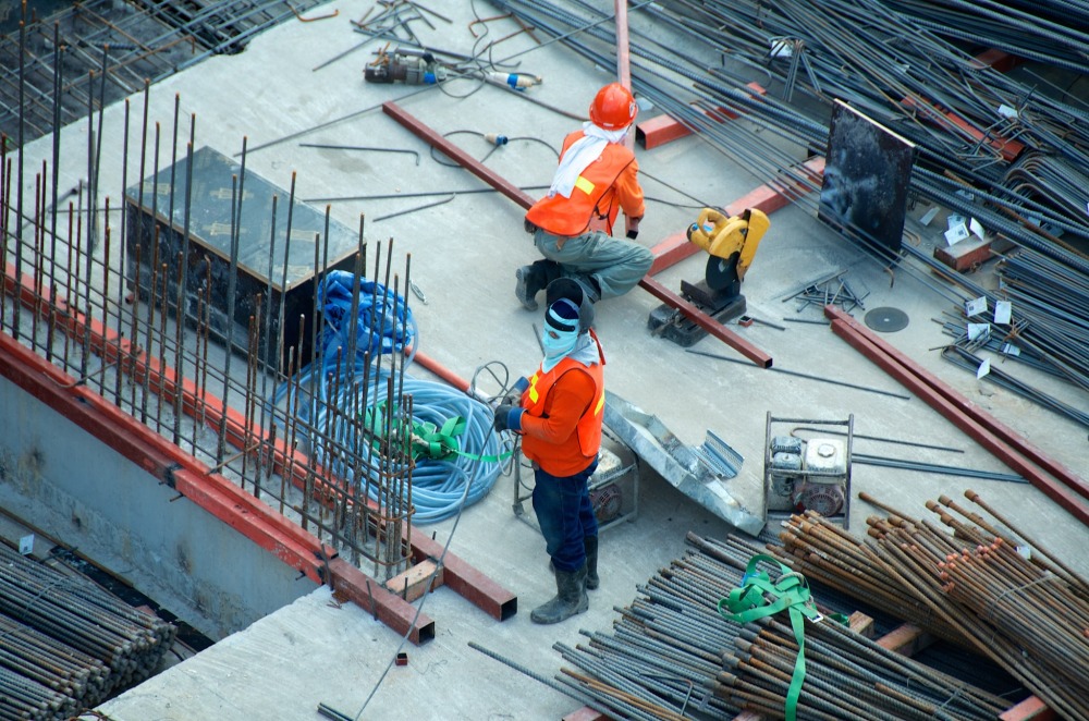 workers. by etienne girardet, unsplash