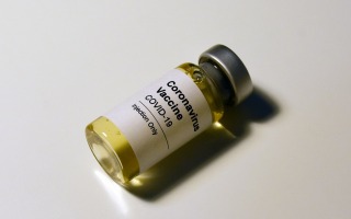 covid-19 vaccine stock photo by hakannural, from UNSPLASH
