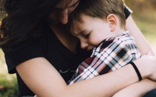 crying child. by Jordan Whitt, unsplash