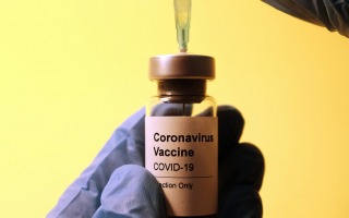 covid-19 vaccine. by hakan nural, unsplash