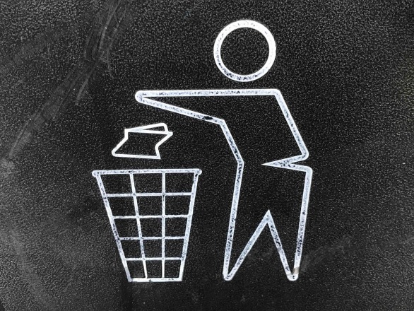 Close up of a recycle garbage bin logo. by gary chan, unsplash