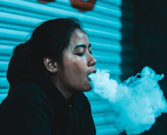 smoking. delfin almonte, unsplash